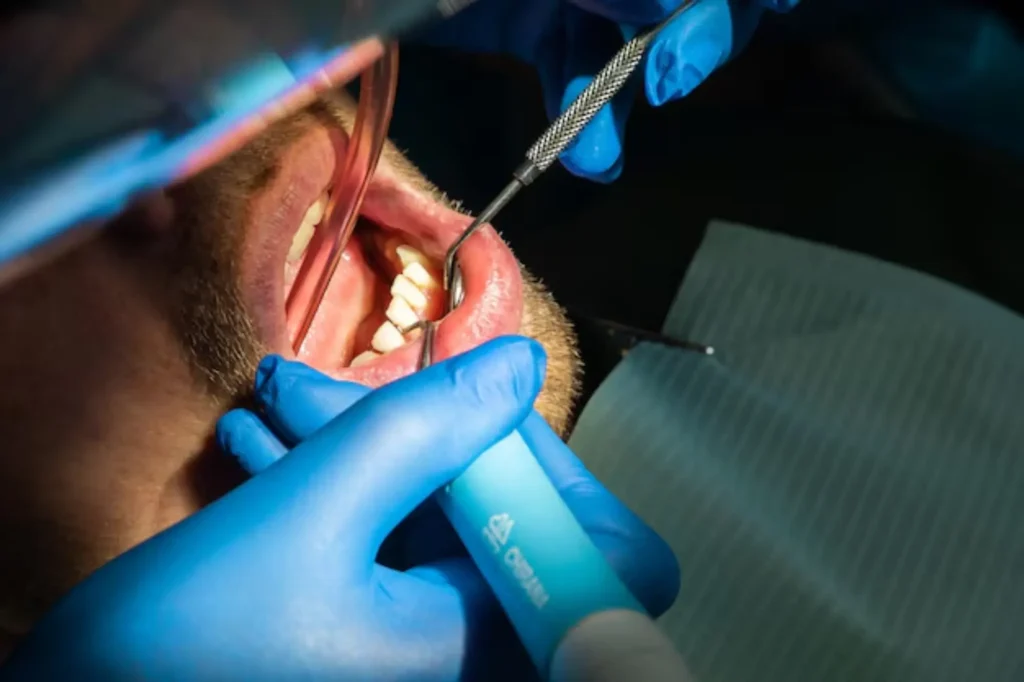 Oral and maxillofacial specialist consulting a patient at Quirónsalud Hospital Dubai