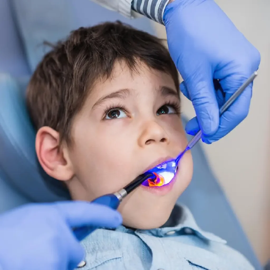 Pediatric dental specialists at Quirónsalud treating young patients with care